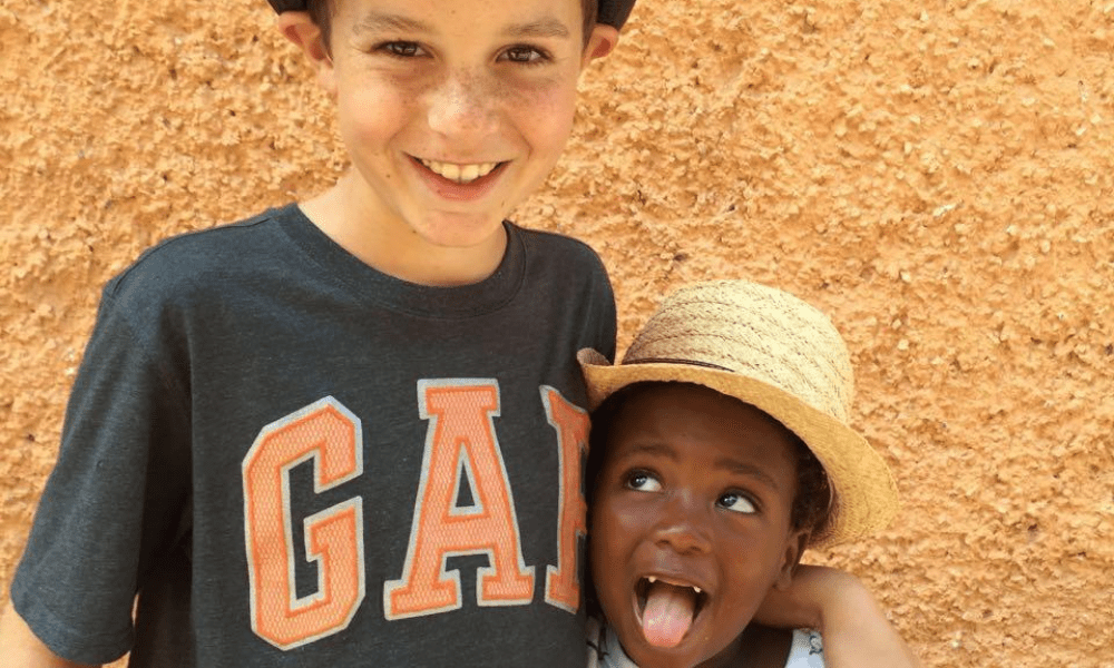 Older white child with his South African kid brother